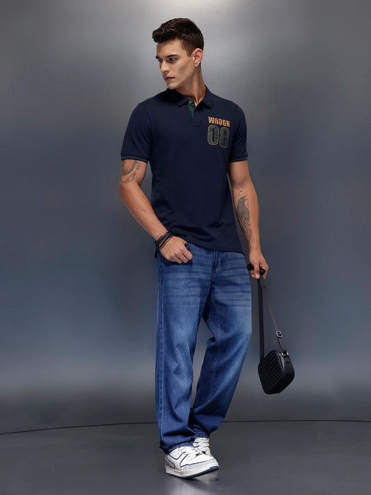 Men's regular fit polo with contrast placket & graphic chest print | Navy Blue